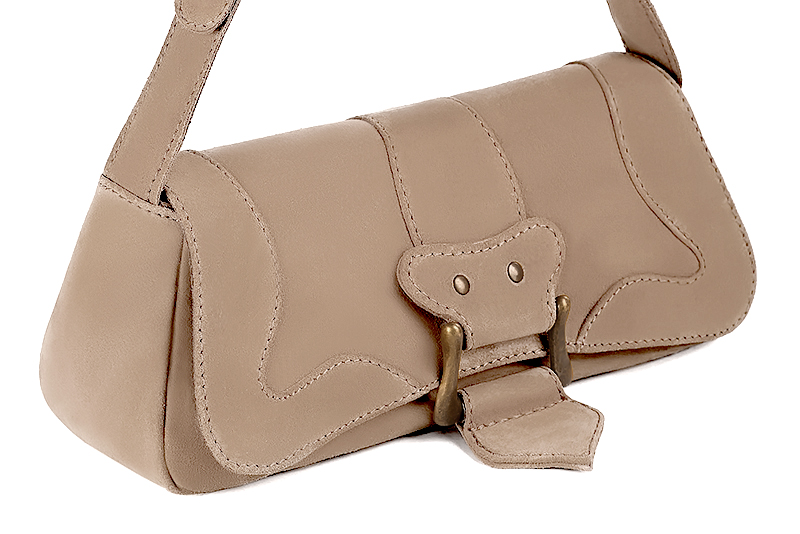 Handcrafted women's small luxurious elegant handbag in premium tan beige leather. Perfect for elevated everyday style.   
                Choose from our luxurious collections of leather and fabric to perfectly match your handbags to your outfits.